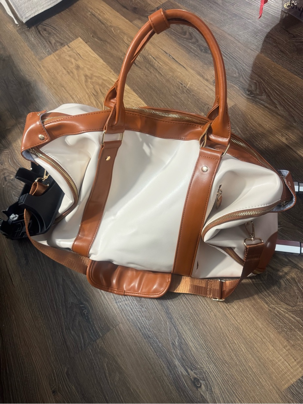 Stylish Cream and Tan Travel Duffel Bag with Wheels